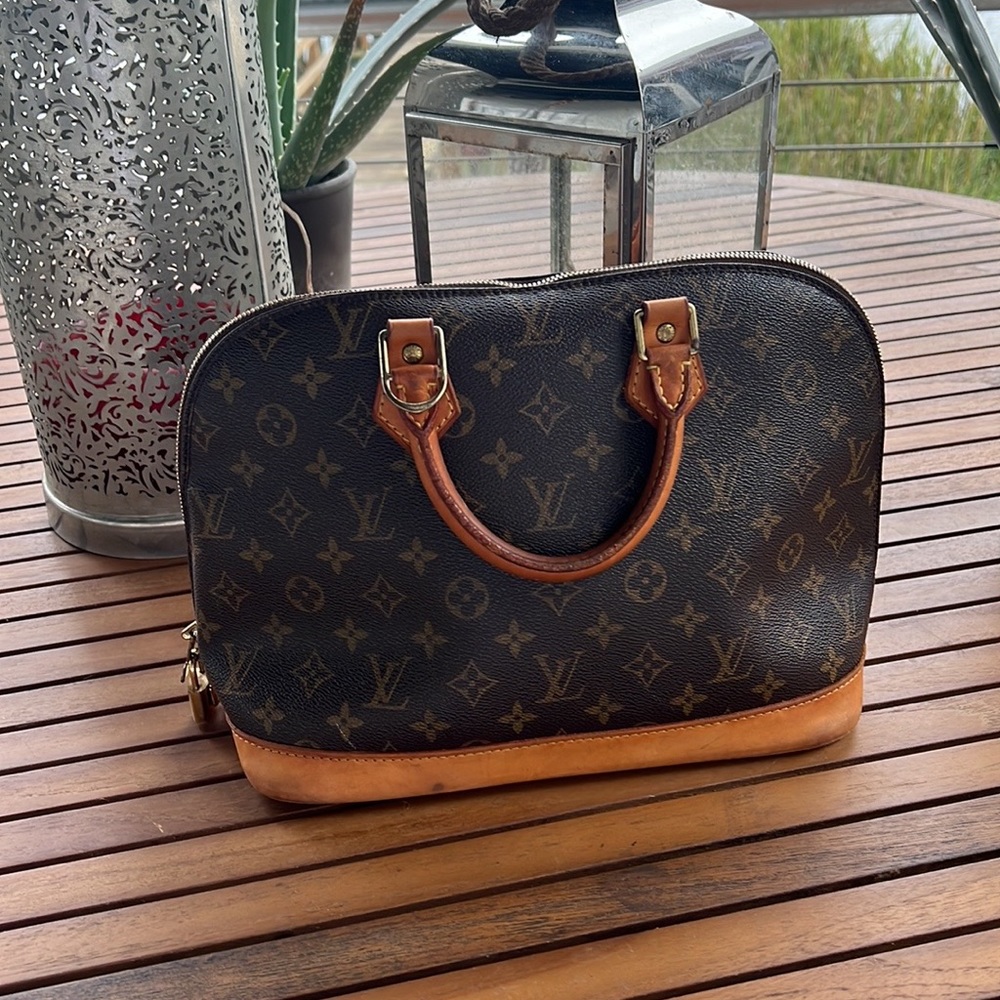 Authentic Louis Vuitton Alma Purse
